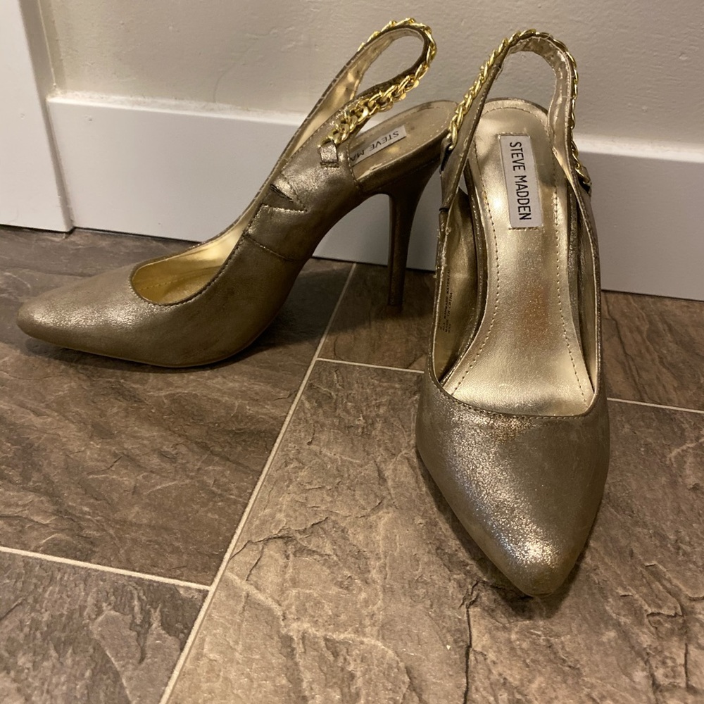 Steve Madden gold heels.